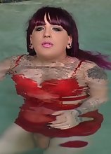 Kelly Clare stripping in the pool